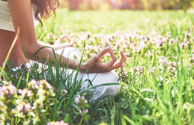 yoga-meditation-in-park-on-the-grass-is-healthy-woman-at-rest